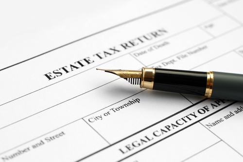 Pen on top of estate tax return form