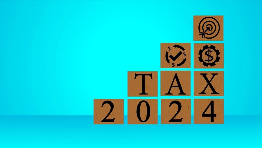 A stack of blocks that spell Tax 2024